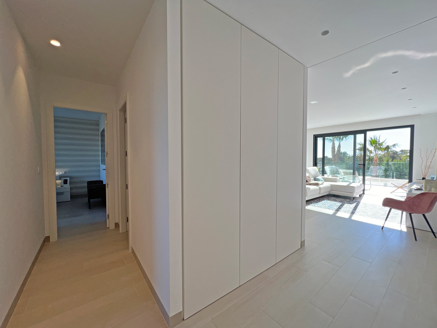 Hallway to living room with terrace