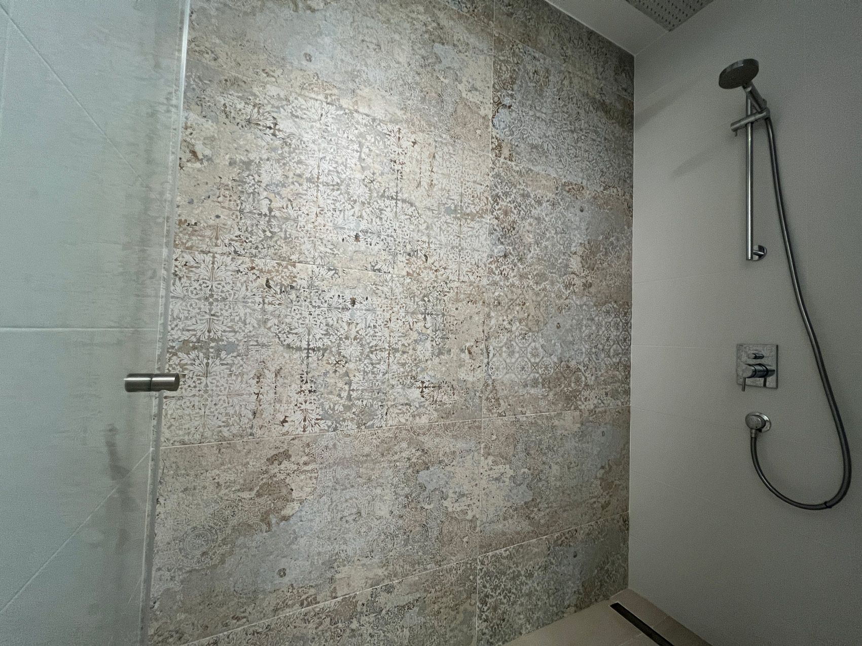 Designer shower with stone tiles